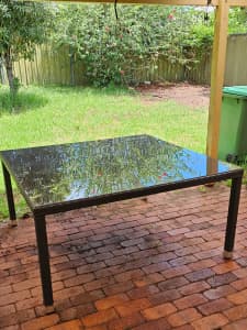 Glass square outdoor table no chairs seats 8