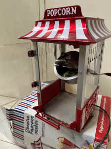 theatre popcorn maker. Party. Red and white striped.
