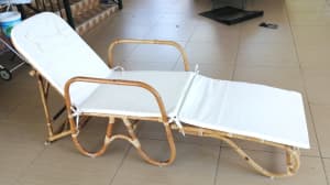 Beautiful cane sunlounge and cushion in near new condition