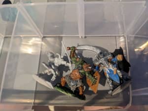 30 Dungeons and Dragons Miniatures and dice