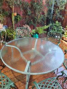 Cast aluminium outside dining table and chairs