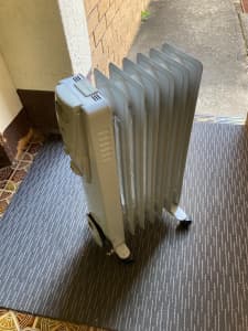 New six bar oil heater with timer