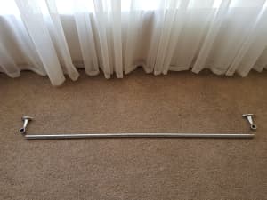 2 medium curtain rods