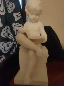 Bisque porcelain statue. 