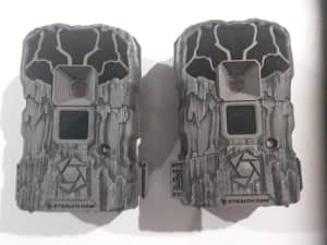 SET of 2 STEALTHCAM trail hunting cameras. Cameras   mauals