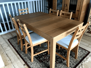 Ikea extending dining table. (two extra inserts) Comes with 6 chairs