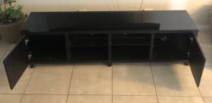 Black TV cabinet with black glass top In immaculate condition