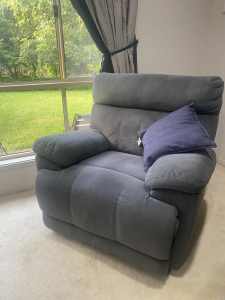 2 single soft bluish grey recliners. Pick up Pacific Pines only.