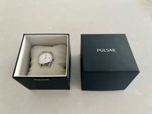 Women’s Pulsar watch face, silver and white