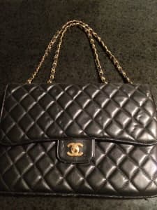 CHANEL Quilted Black Handbag with gold chain