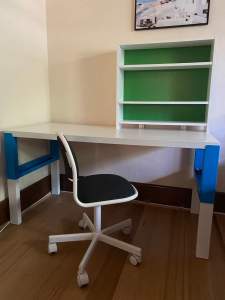 Ikea adjustable desk with shelf and chair