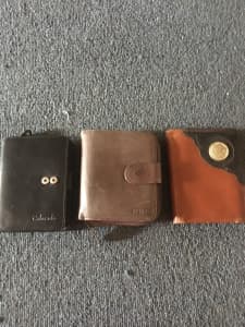Three genuine Leather Wallets