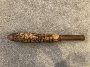 Traditional hand engraved wooden club