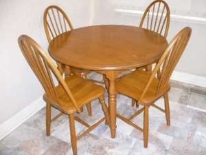 Solid timber round table and 4 chairs