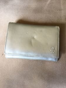 Atelier wallet silver. $2 each, 3 for $5 specials. Jim’s § specials
