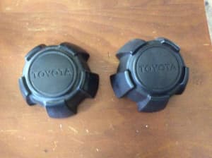 2 center caps available for Toyota hilux ute original black   inspecti