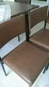Brown leather look chairs