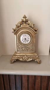 Gold mantel clock. New, never used. 