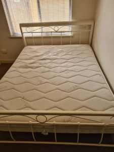 Queen size wood and metal decorative bed with near new mattress