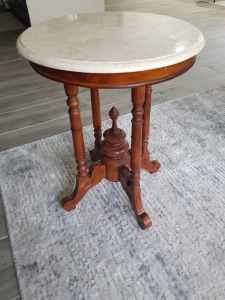 Small wooden table with removable stone top