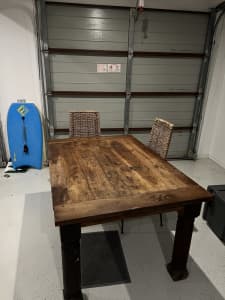 Hardwood table with cane chairs
