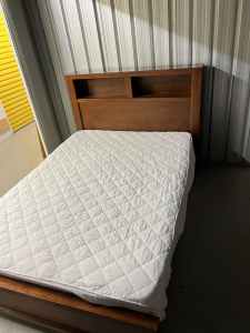 Wooden double bed with mattress delivery available
