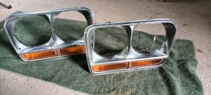 Pair of Valiant CL CM Headlight Surrounds with Amber Lenses