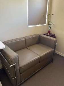 Two seater beige leather sofa