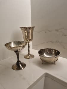 Silver bowls and wine glass