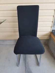 Black vinyl dining chairs with new fabric covers