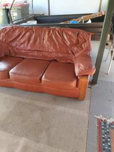 Leather lounge .good as extra bed