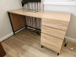 Oak coloured desk with 3 drawers