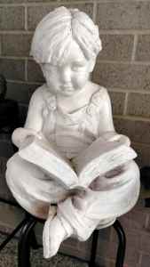 Boy reading a book Statue 