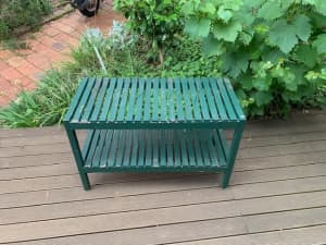 Solid Wood Ikea Molger bench painted dark green with storage shelf.