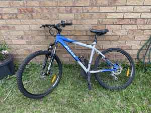 Two mountain bikes and accessories