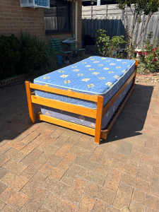 Single wooden bed frame with spare