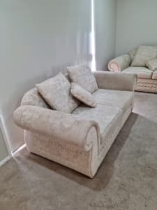 Two seater lounge with cushions 