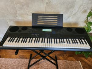 Casio WK-6500 keyboard with stand, case and power