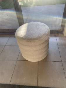 Fluffy white seat with storage