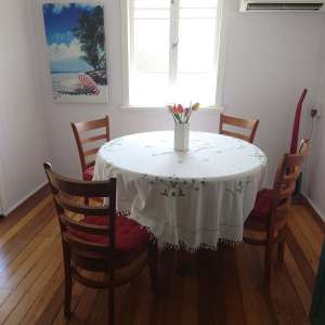 Table, extendable solid wooden dining table with four chairs