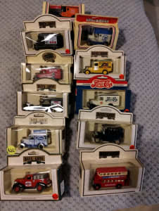11 vintage model cars (1:43) made by Lledo of England 