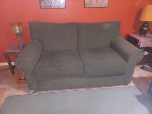 Comfortable and stylish 2 seater lounge. 1.8 wide x .9 high x 1 deep.