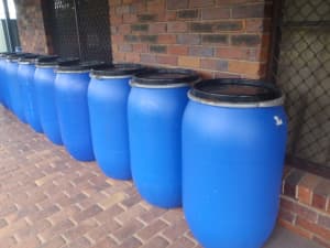 200 liter plastic drums with removable lids and locking rings. 