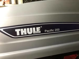 THULE PACIFIC 200 ROOF STORAGE POD WITH MATCHING ROOF RACKS AND KEYS..