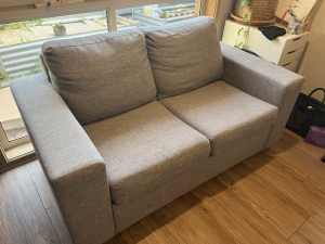 Two-seater fold out sofa