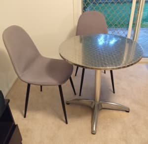Cafe-style metal dining table $20