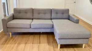 Couch - Grey Fabric, Chaise L234cm x W152cm (Including Chaise) VGC