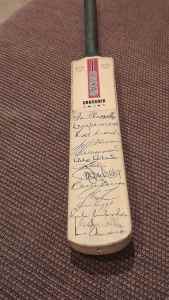 Signed mini cricket bat