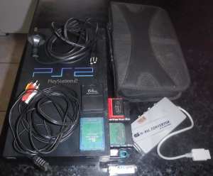 PlayStation 2 console (SLOWCONTROLLERRESPONSE)4xMemcard2xWirelessAdapt