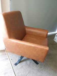 Tan Swivel chair